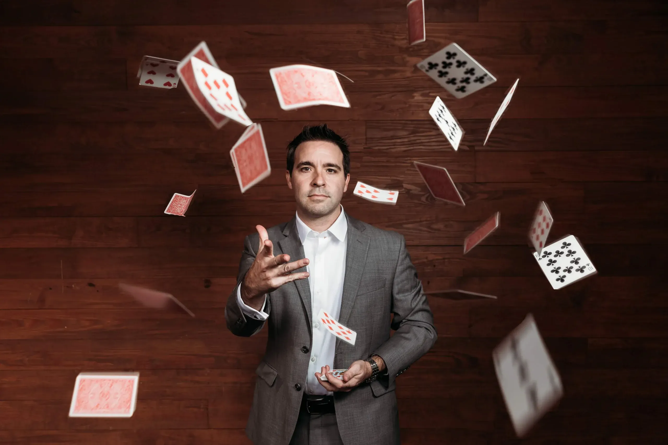 Playing cards thrown into the air.